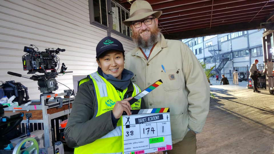 CATO Traffic Supervisor, Covid Manager & Safety Assistant Emerald Kinnerson on set for the ABC television series Dance Academy. Sydney. CATO Traffic Supervisor, Covid Manager & Safety Assistant Emerald Kinnerson on set for the ABC television series Dance Academy. Sydney, 2018.
